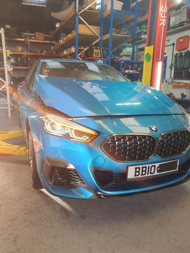 A BMW inside the MT Auto Parts dismantling facility
