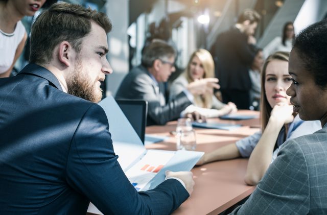 Business People Having a Meeting in the Board Room