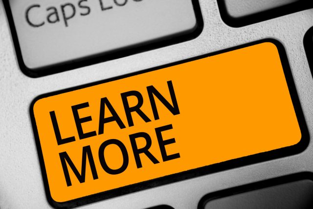 Conceptual hand writing showing Learn More. Business photo showcasing Deepen knowledge of the thing you want to do or new skill Keyboard orange key computer computing reflection document.