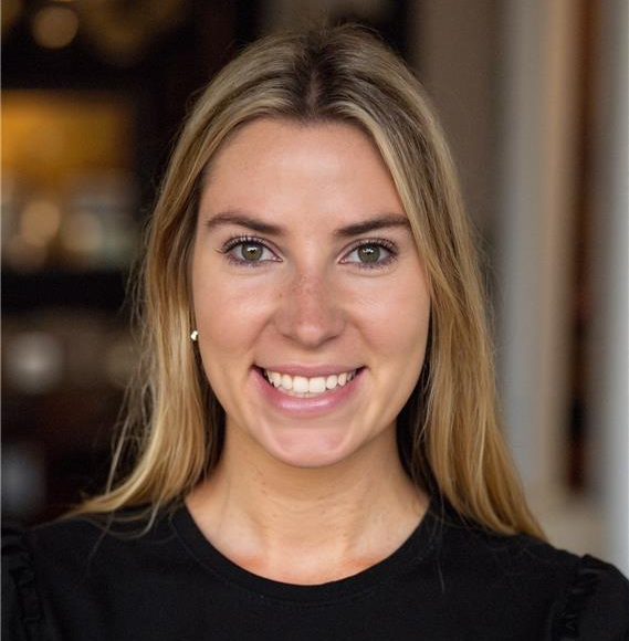 mary-hoover-drucker-black-top-smiling-headshot-1