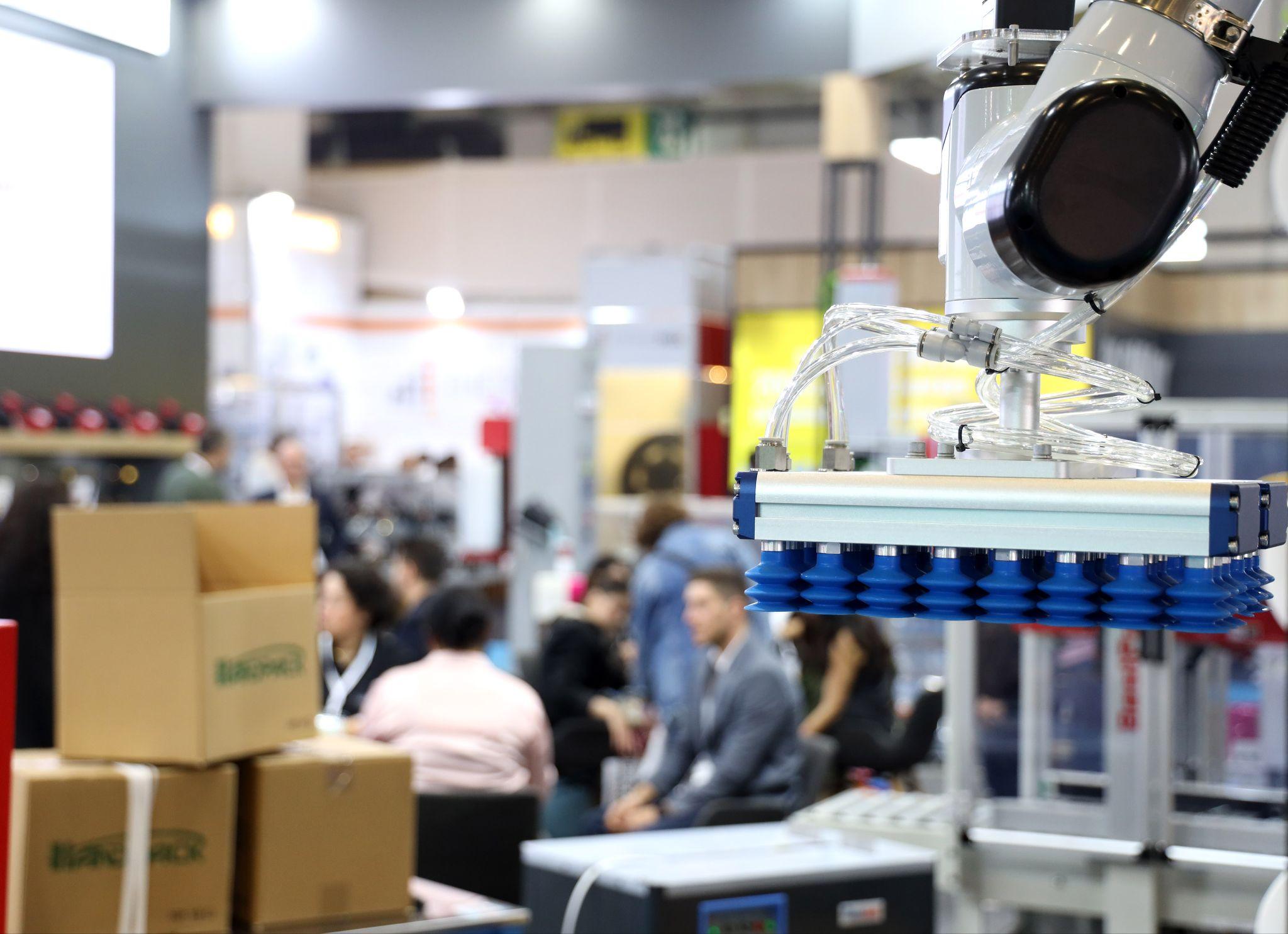 Hosted Buyer Program returns as Istanbul gathers the global packaging industry: a robotic vacuum gripper lifting cartons on an exhibitor stand at Eurasia Packaging Istanbul